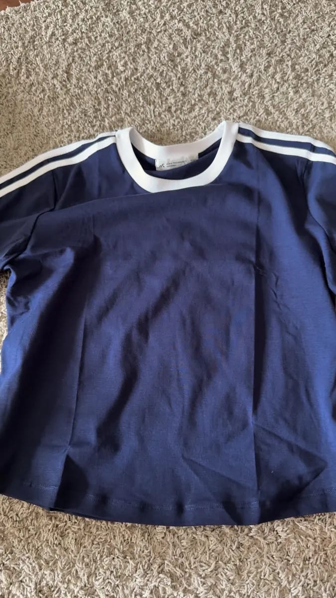 Customer photo review of Striped Curved Hem Baby Tee