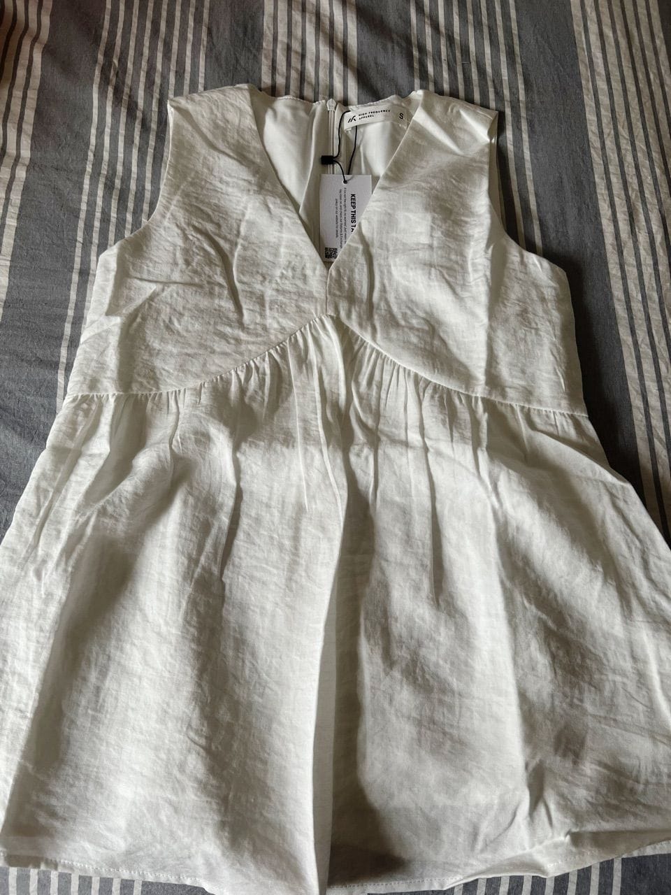 Customer photo review of V-Neck Textured Iron-Free Sleeveless Blouse