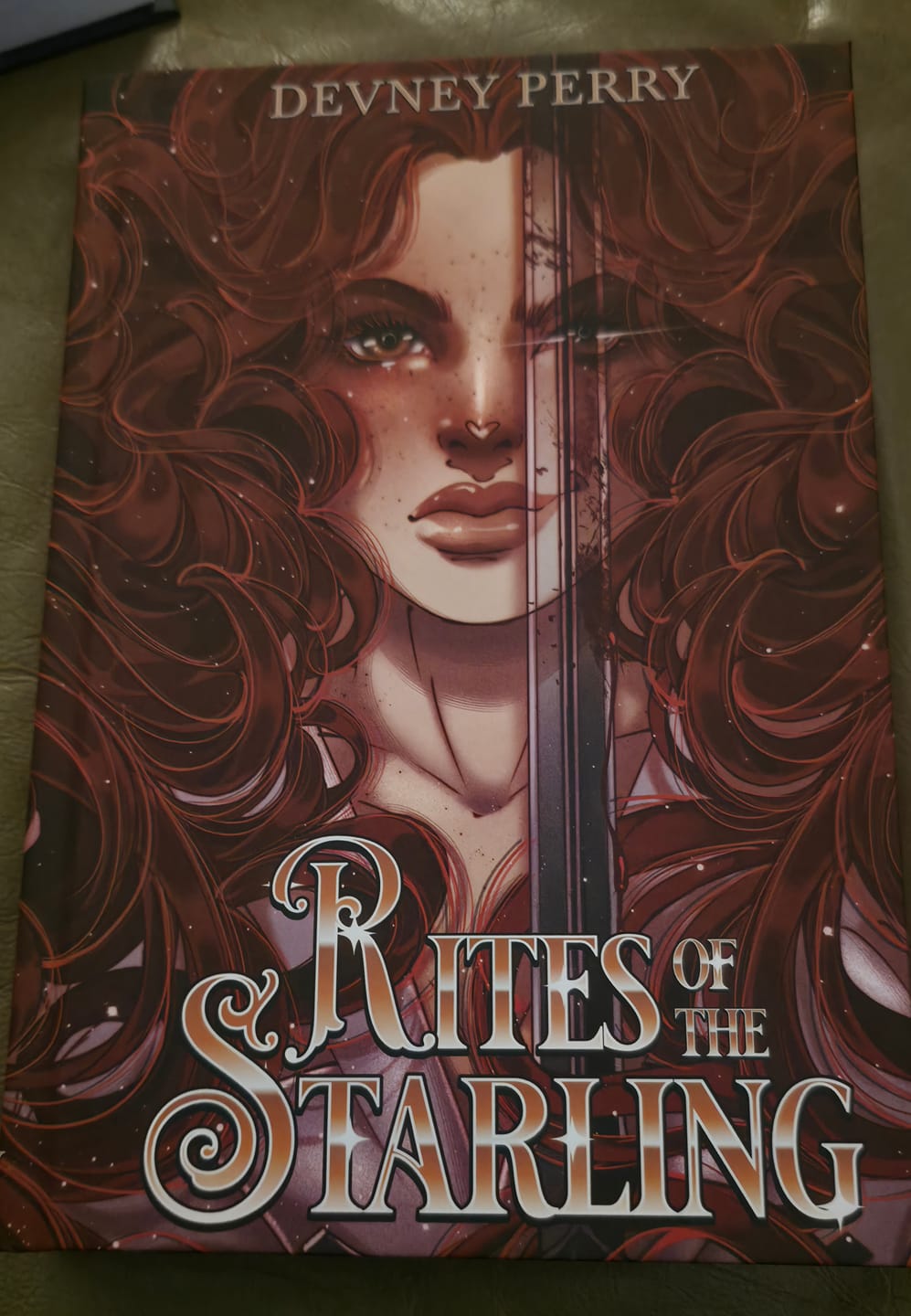Customer photo review of PS Hardcover SE Rites of the Starling by Devney Perry