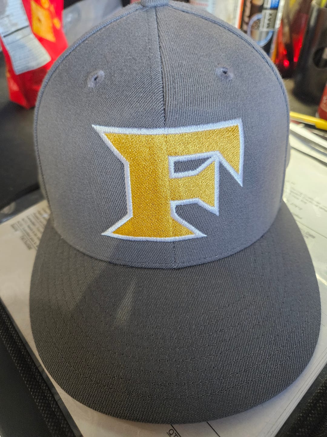 Customer photo review of Flexfit 210 Flat Bill Cap. C808