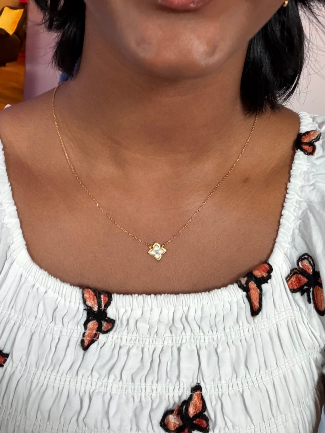 Customer photo review of Dalia White Iris Clover Necklace