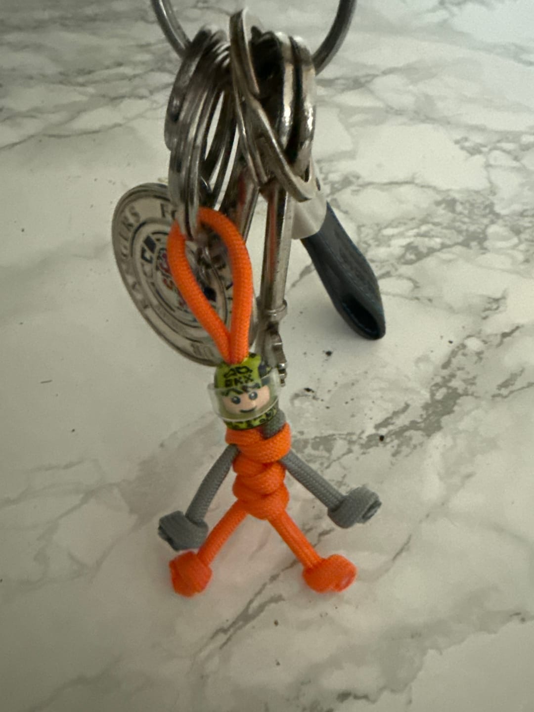 Customer photo review of Limited Edition Lando Norris Racing Paracord Buddy Keychain