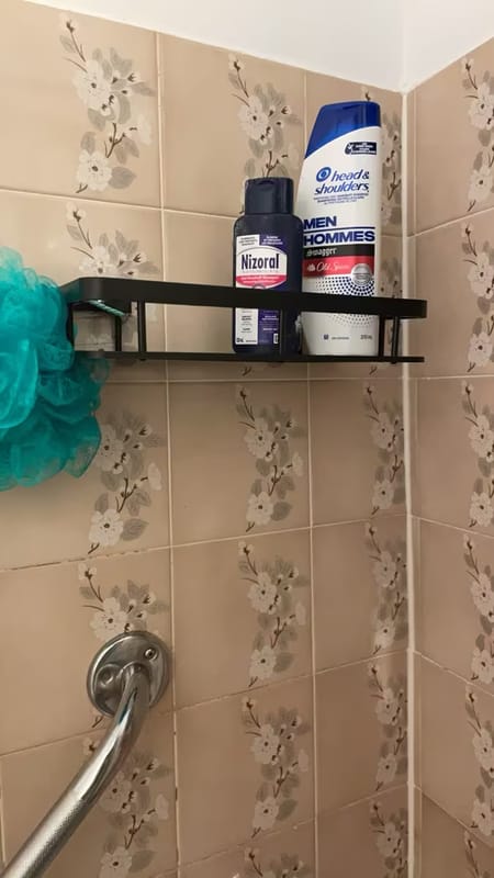 Customer photo review of Floating Shower Shelf
