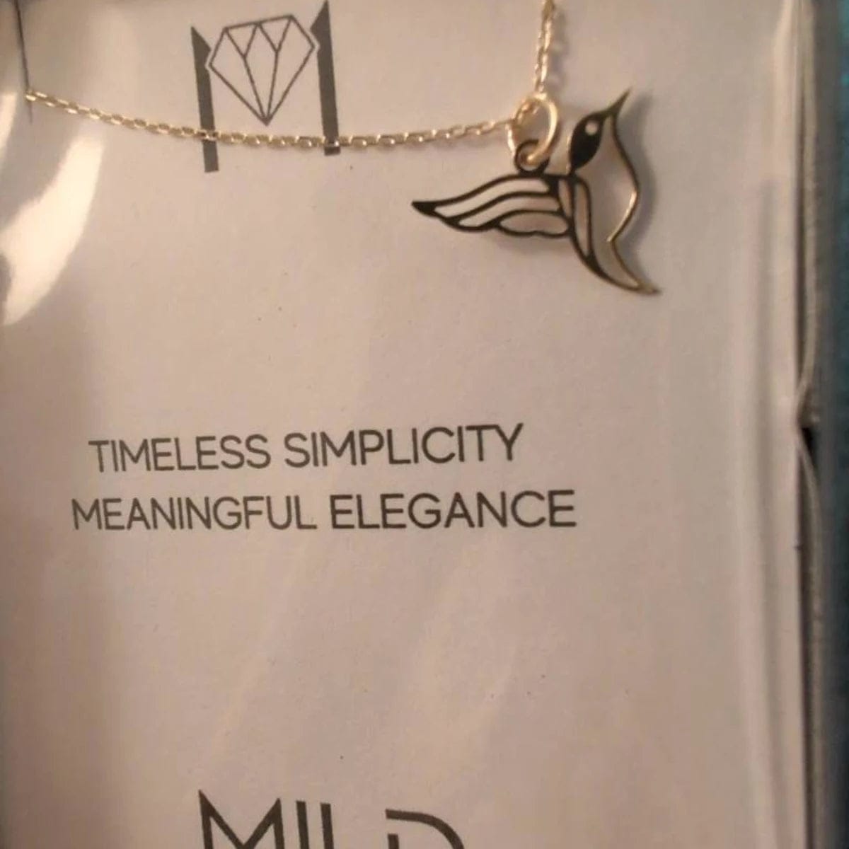 Customer photo review of Hummingbird Necklace – Gold Vermeil on Sterling Silver Dainty Charm