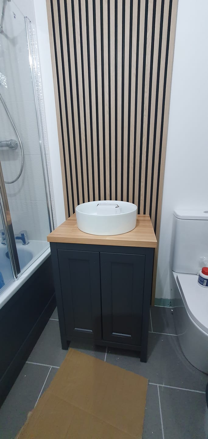 Customer photo review of SlatWall Waterproof Natural Oak and Black End Cap