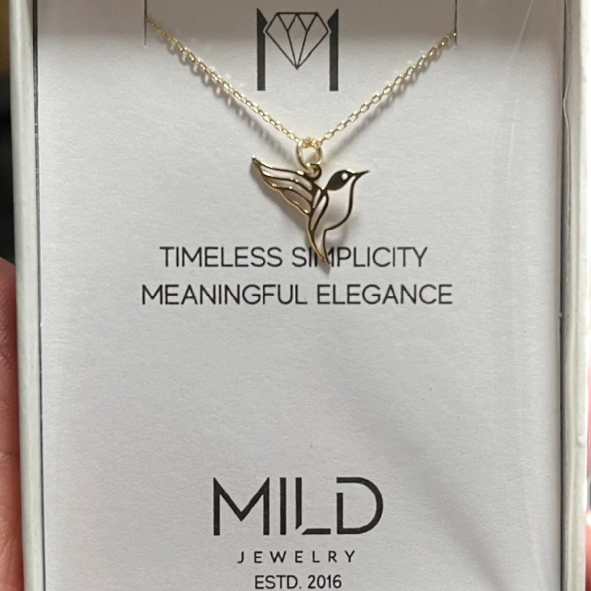 Customer photo review of Hummingbird Necklace – Gold Vermeil on Sterling Silver Dainty Charm