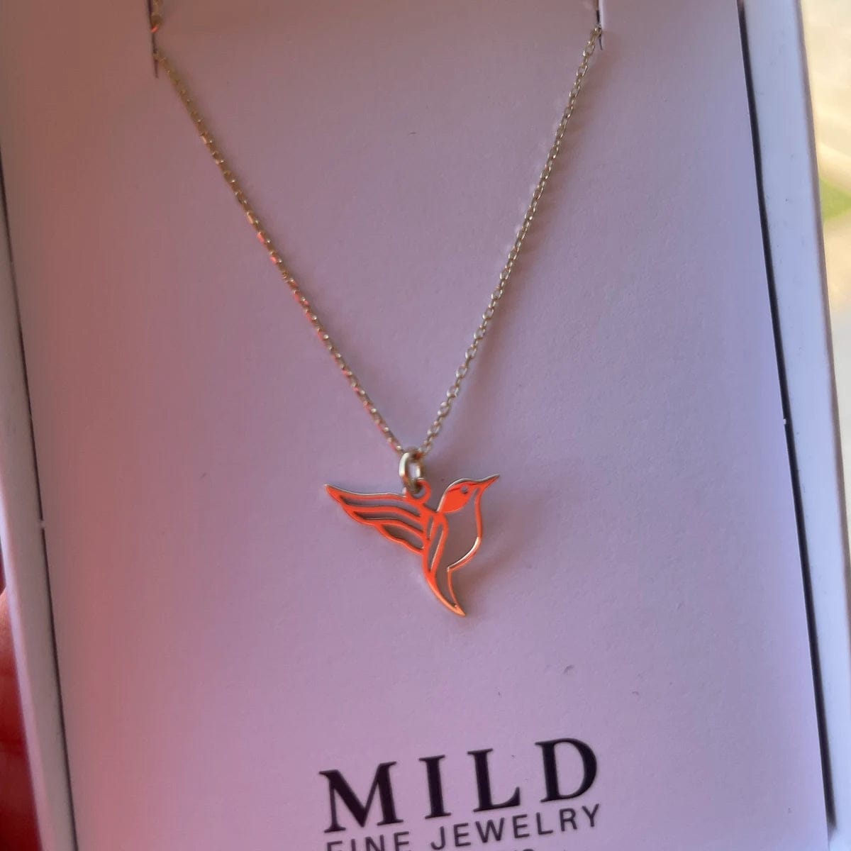 Customer photo review of Hummingbird Necklace – Gold Vermeil on Sterling Silver Dainty Charm