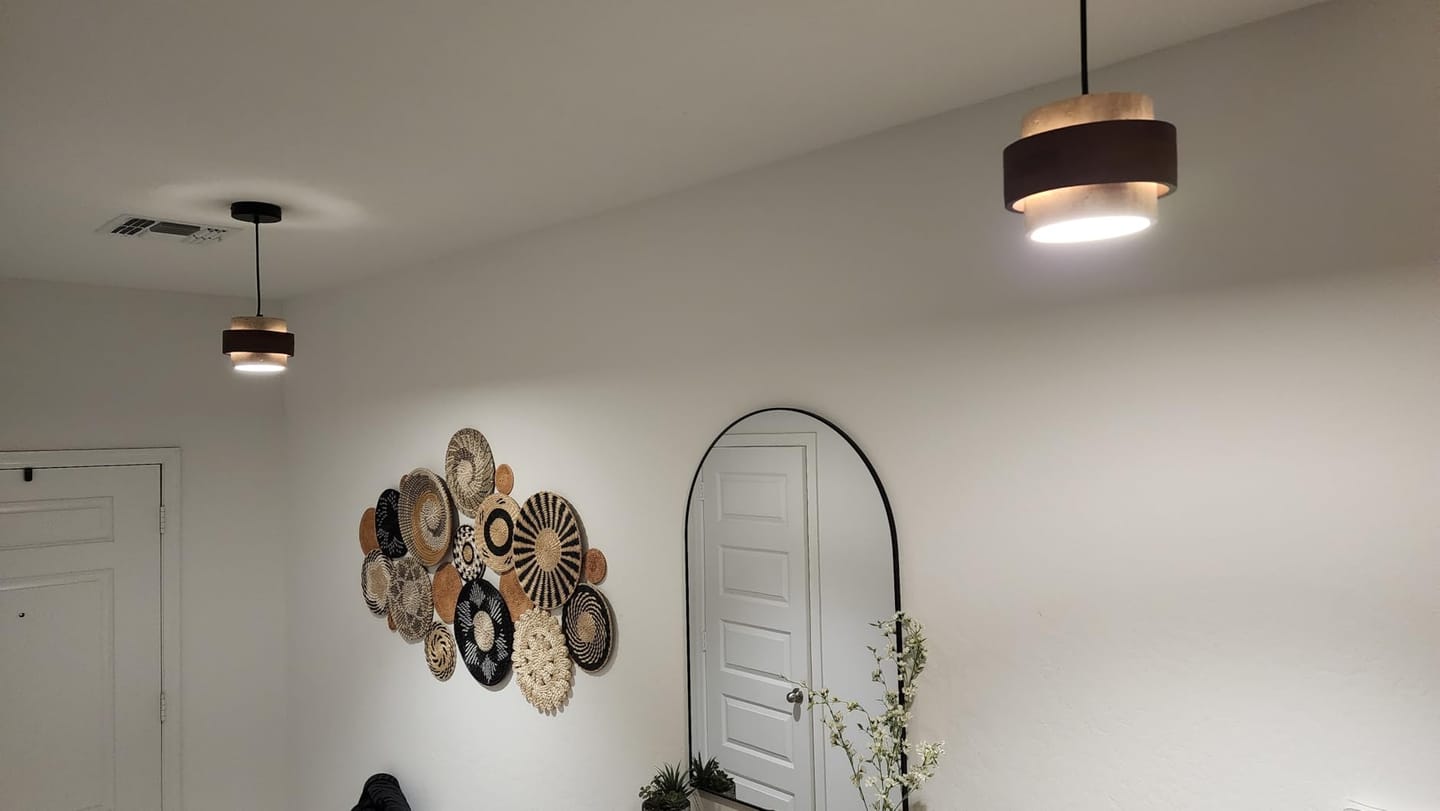 Customer photo review of Sterling Travertine Walnut Pendant Light