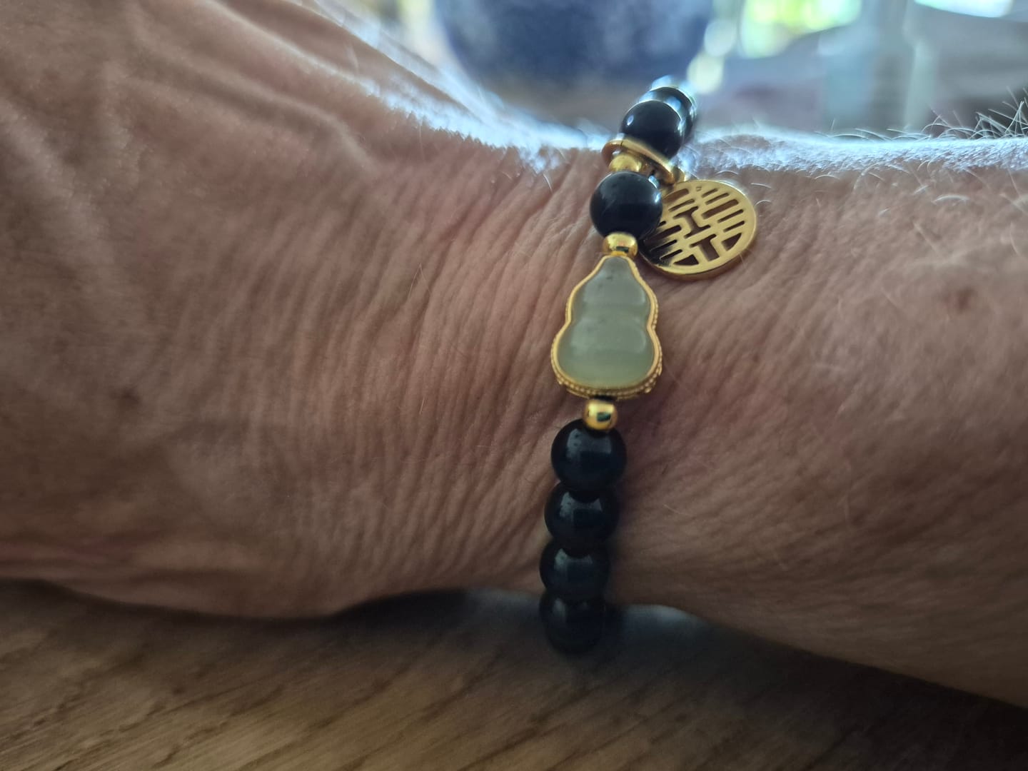 Customer photo review of Natural Black Obsidian Hetian Jade Gourd Double Happiness Strength Bracelet