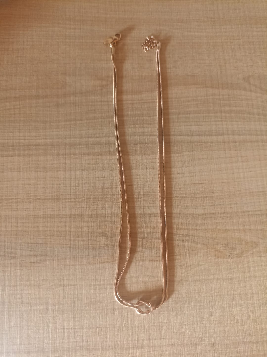 Customer photo review of Collana nodo infinito morbido in acciaio