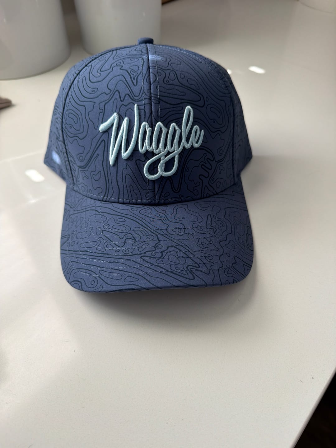 Customer photo review of Waggle Brand Hat - Loon Lake Topographic