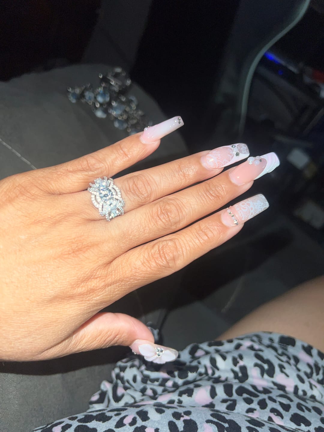 Customer photo review of Five Stone Round Moissanite Multi-Row Crossover Pave Engagement Ring