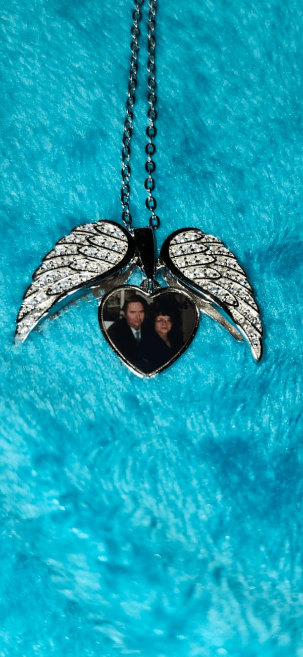 Customer photo review of Custom Angel Wing Photo Locket Necklace