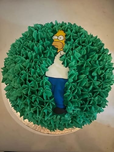 Customer photo review of Homer Bush Cake Topper