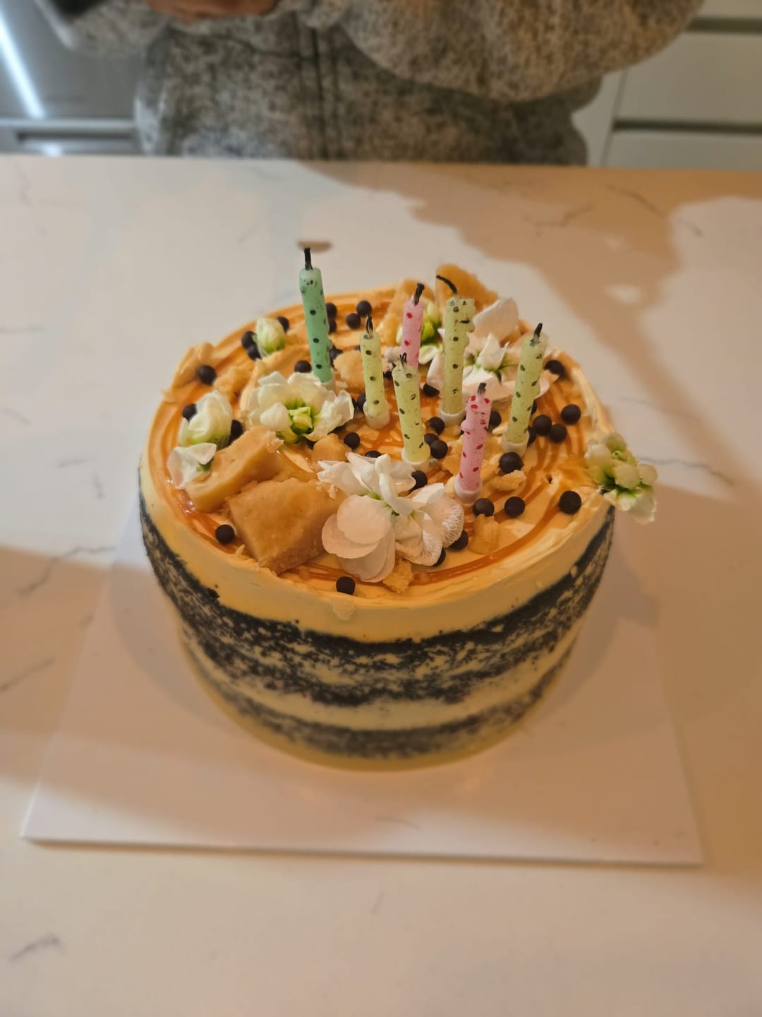 Customer photo review of chocolate caramel cake