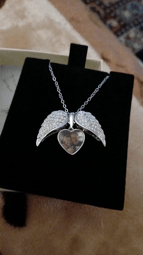 Customer photo review of Custom Angel Wing Photo Locket Necklace