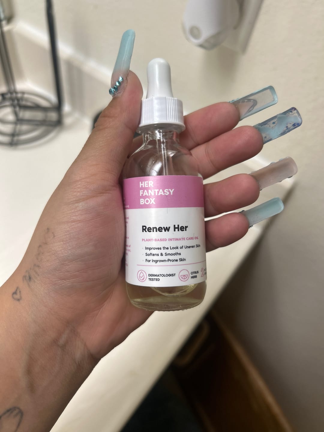 Customer photo review of Her Fantasy Box Renew Her Yoni Oil - For Dryness, Ingrown Hair, Dark Marks & Scars