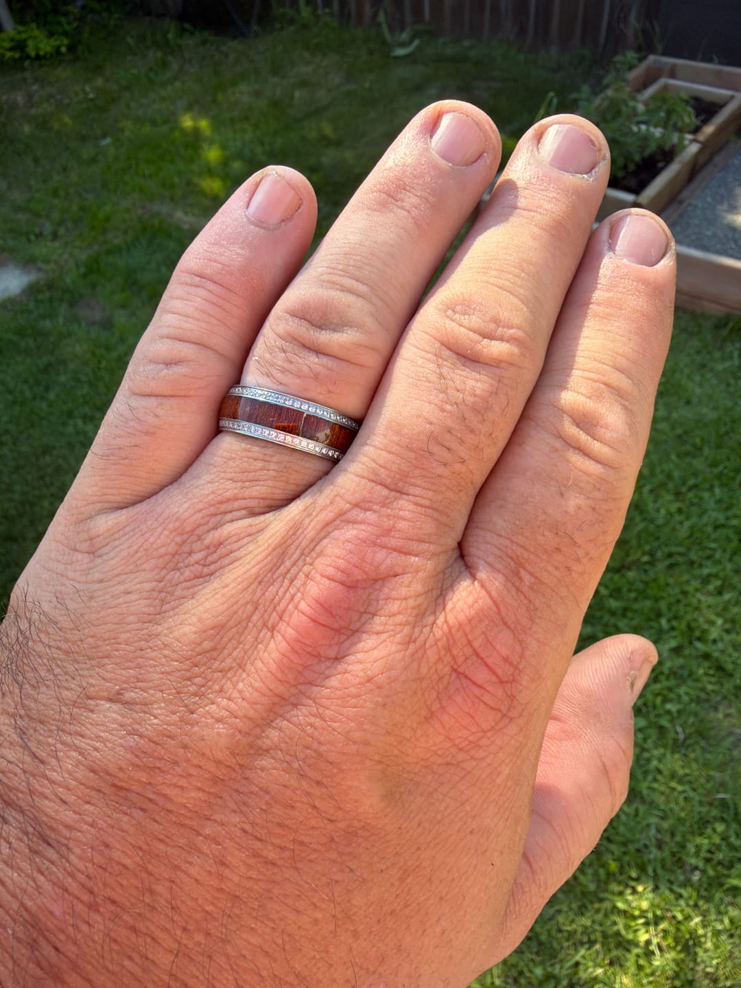 Customer photo review of 8mm - Mens Titanium Wedding Band W/ Koa wood and diamonds