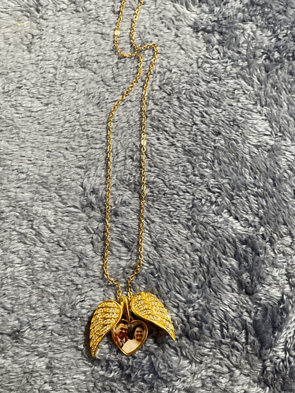 Customer photo review of Custom Angel Wing Photo Locket Necklace