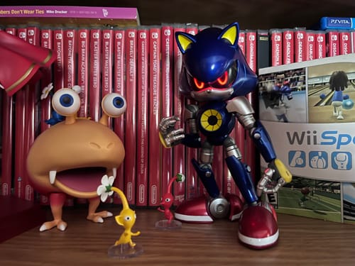 Customer's Modern Metal Sonic figure displayed out of the box on a shelf with other video game collectibles.