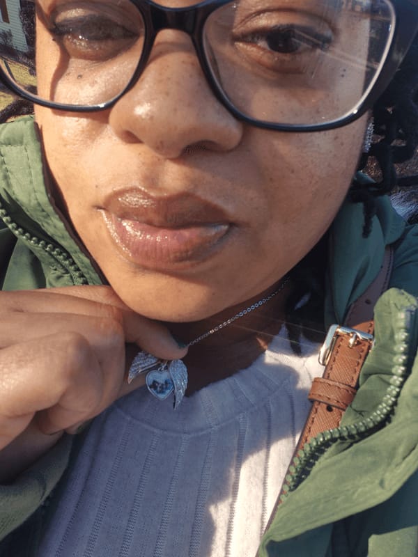 Customer photo review of Custom Angel Wing Photo Locket Necklace