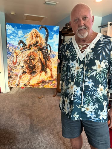 Customer holding his finished Custom Paint by Numbers Kit, a detailed painting of a Scorpion Queen riding a Ram.