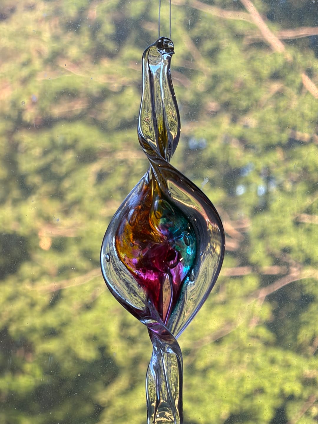 Customer photo review of Dichroic Spinner Suncatcher with Infused Cremains