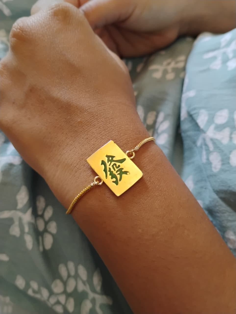 Customer photo review of Mahjong Green Dragon Rakhi
