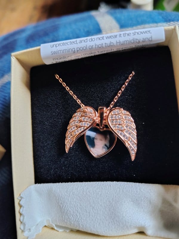 Customer photo review of Custom Angel Wing Photo Locket Necklace