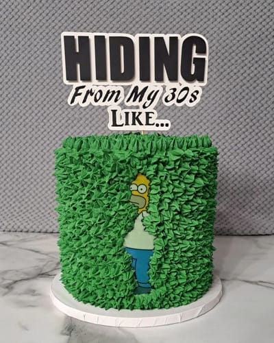 Customer photo review of Homer Bush Cake Topper