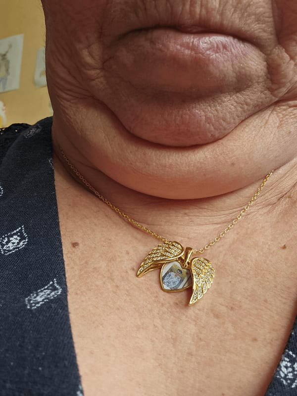 Customer photo review of Custom Angel Wing Photo Locket Necklace