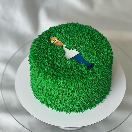 Customer photo review of Homer Bush Cake Topper