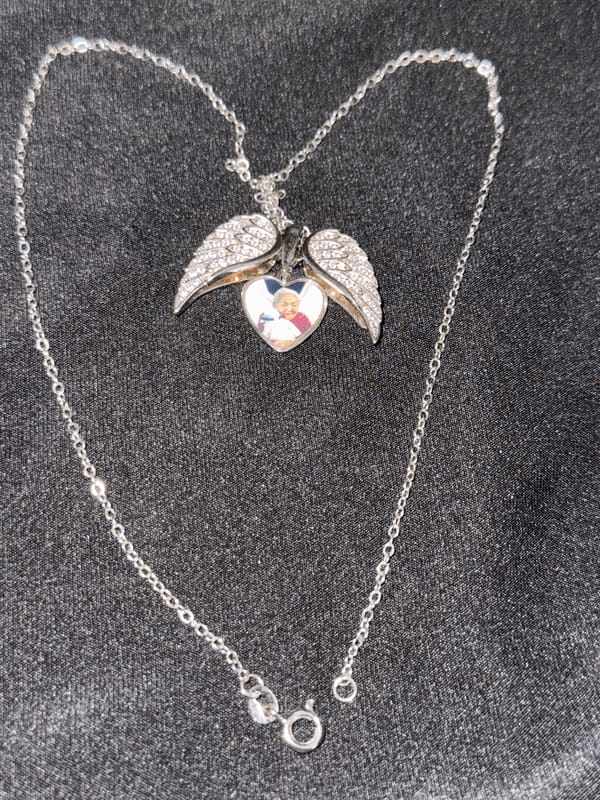Customer photo review of Custom Angel Wing Photo Locket Necklace