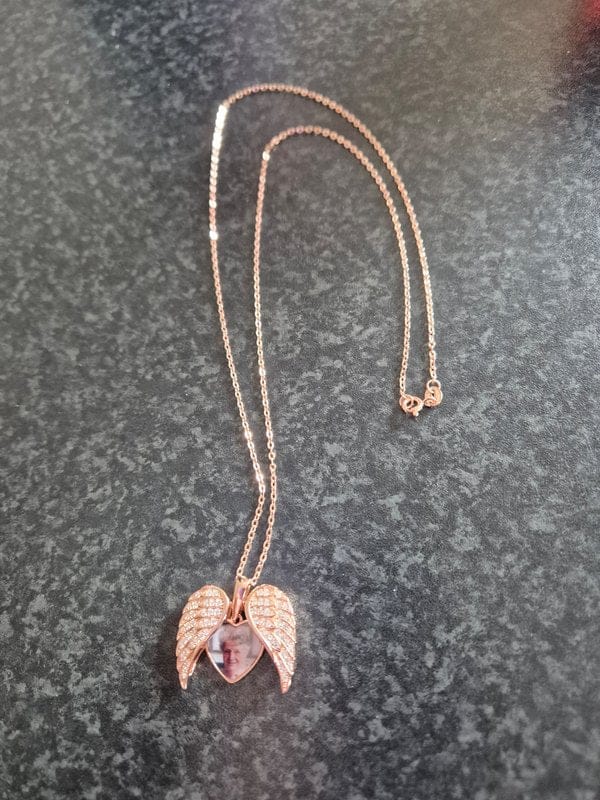 Customer photo review of Custom Angel Wing Photo Locket Necklace