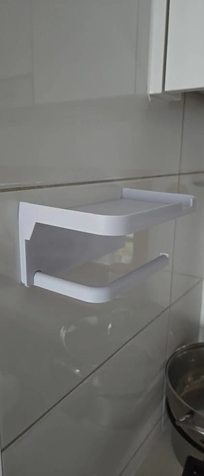 Customer photo review of Wall-Mounted Toilet Paper Holder with Storage Shelf