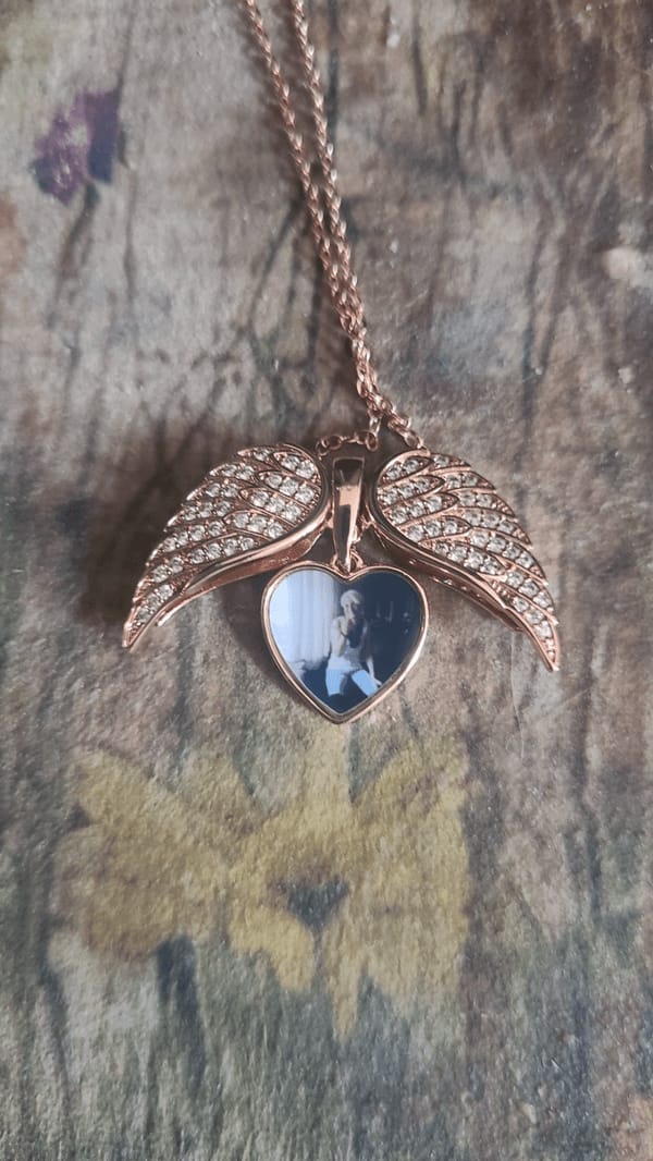 Customer photo review of Custom Angel Wing Photo Locket Necklace