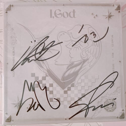 Customer's hand-autographed XLOV 'I,God' promo album showing multiple signatures in black ink on the front cover.