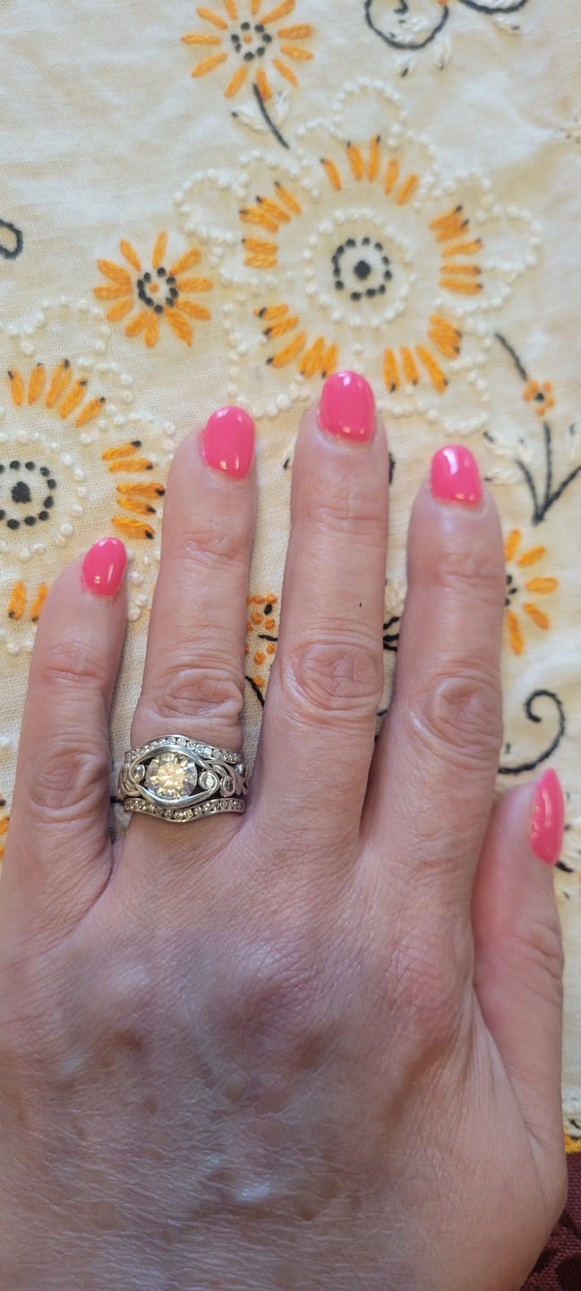 Customer photo review of Bezel Set Round Moissanite Scroll Accents Engagement Ring