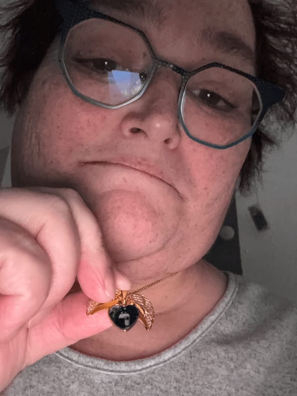 Customer photo review of Custom Angel Wing Photo Locket Necklace