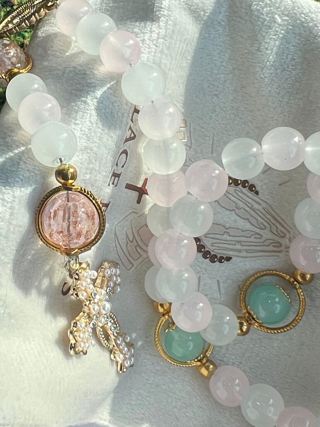 Customer photo review of SolaceBeads Artistic Pink & White Beaded Rosary: A Fusion of Colors & Sacred Symbols