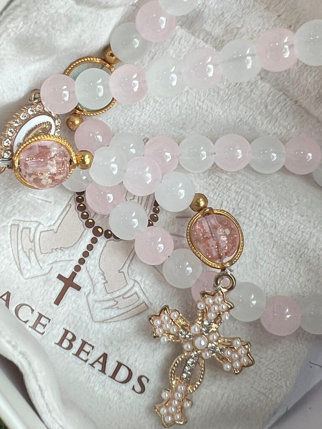 Customer photo review of SolaceBeads Artistic Pink & White Beaded Rosary: A Fusion of Colors & Sacred Symbols