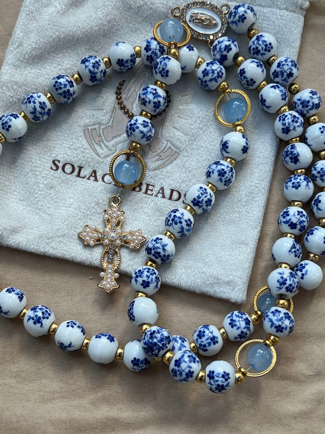 Customer photo review of SolaceBeads Handcrafted Blue Floral Ceramic Rosary: A Tapestry of Grace in life