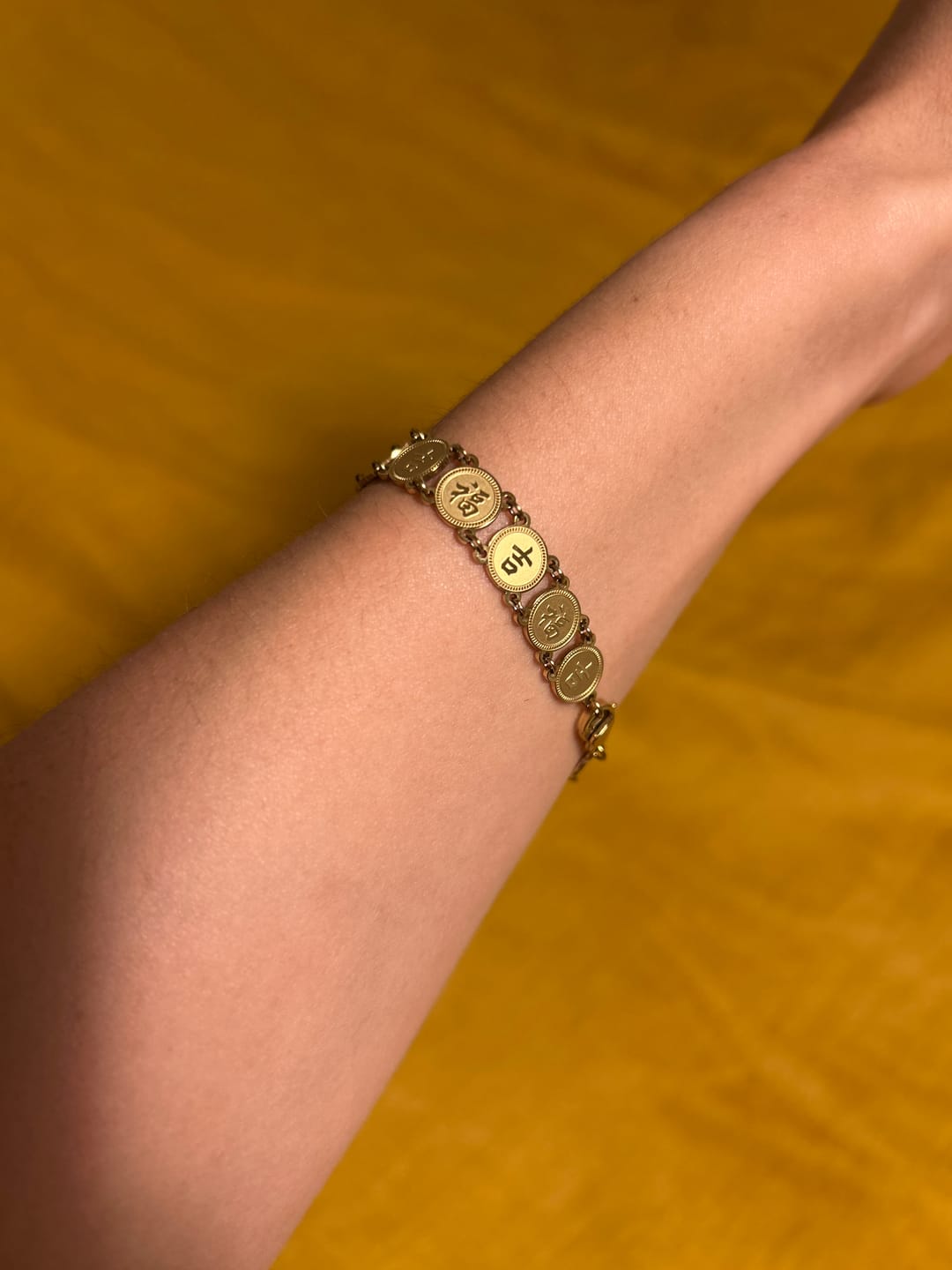 Customer photo review of Lucky Coin Bracelet