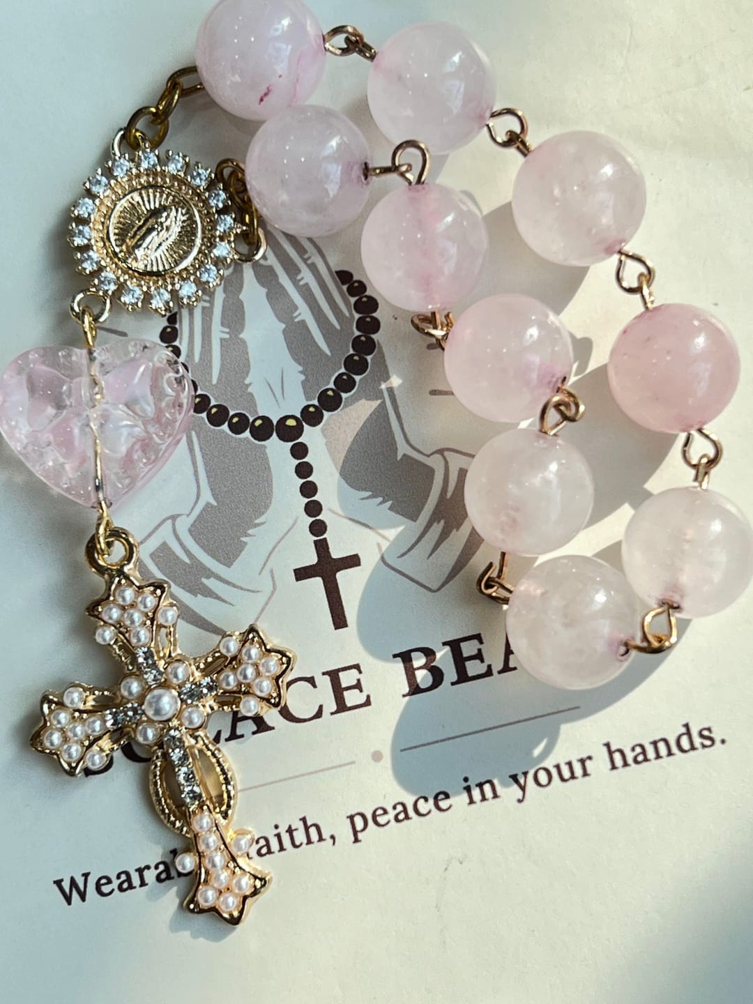 Customer photo review of SolaceBeads Artisan Rose Quartz Pocket Rosary: Soft Pink Beads with Sacred Cross & Marian Accents