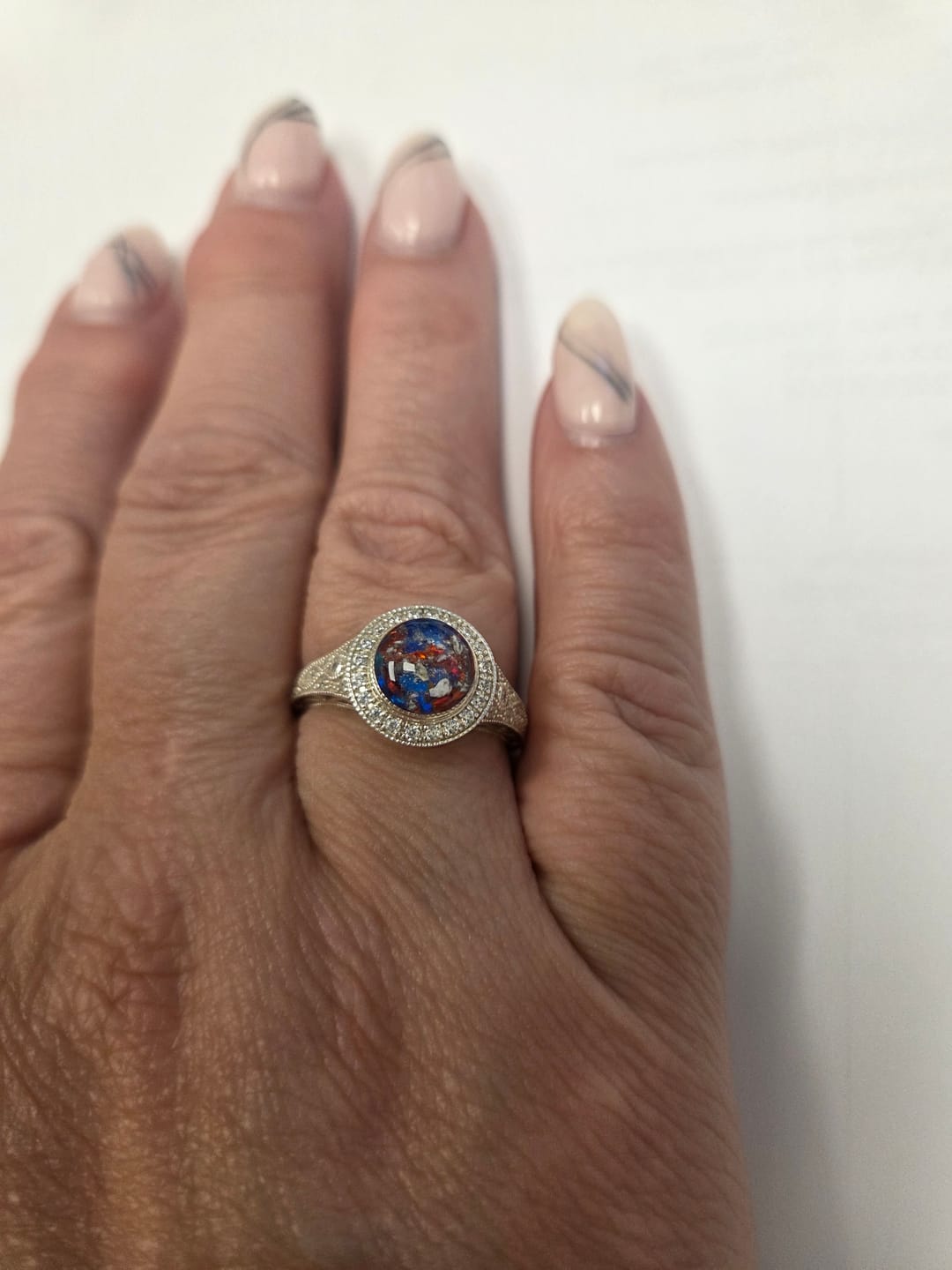 Customer photo review of Bedazzled Filigree Circle Opal Cremation Ring
