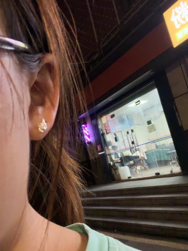 Customer photo review of Divine Plume Angel Wings 925 Sterling Silver Stud Earrings™