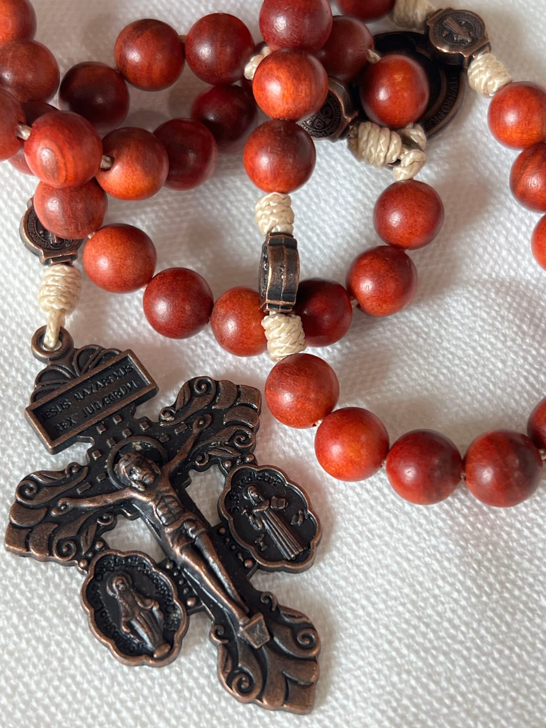 Customer photo review of SolaceBeads Dragon Blood Wood Beads St. Benedict Protection Shield Rosary
