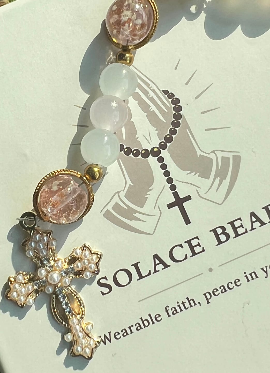 Customer photo review of SolaceBeads Artistic Pink & White Beaded Rosary: A Fusion of Colors & Sacred Symbols