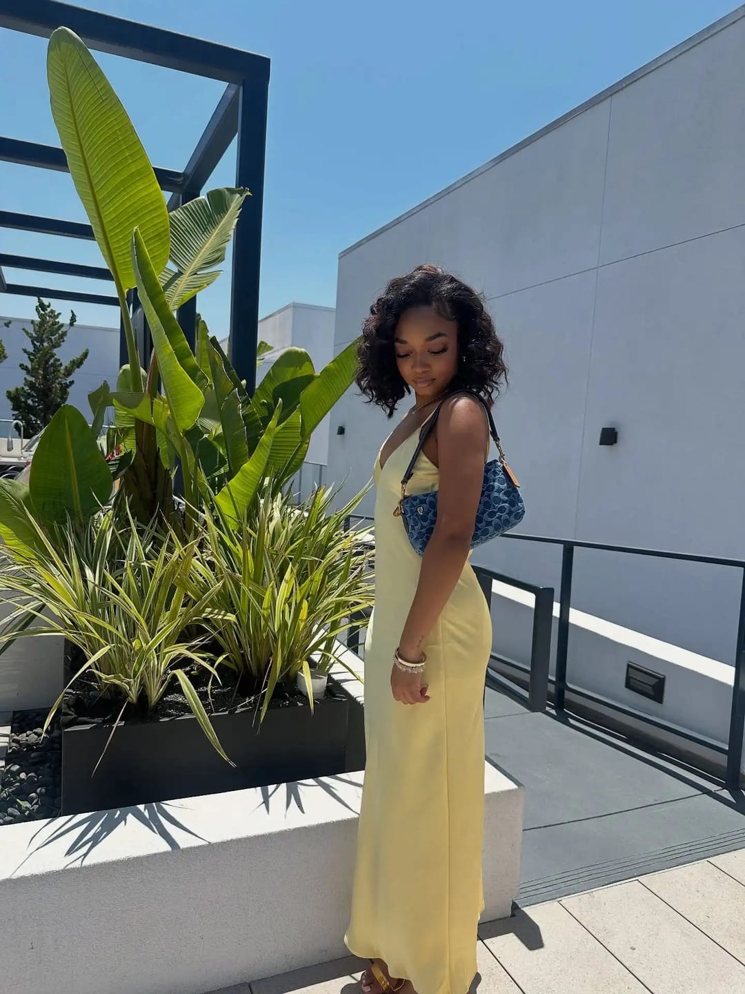 Customer photo review of Kirra Satin Backless Maxi Dress