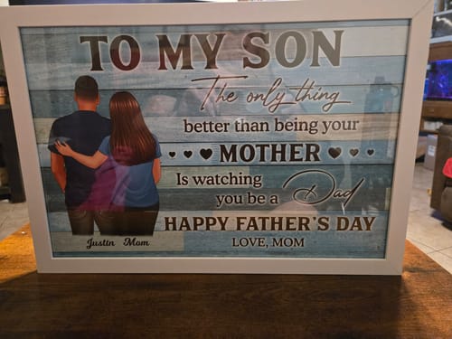 Customer's 'To My Son' personalized poster, displayed in a white frame on a table.